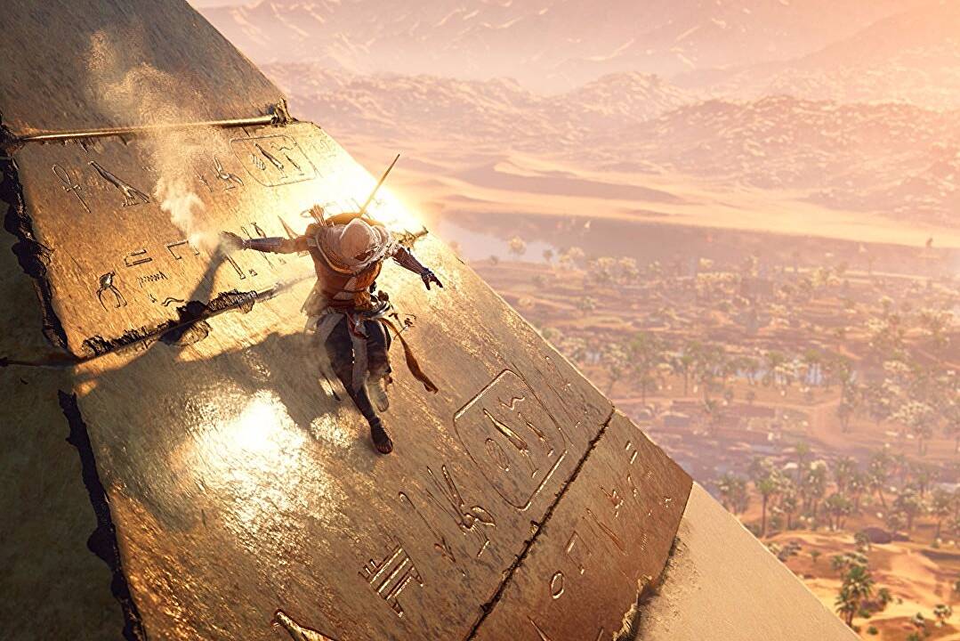 Assassin's Creed Origins 2023 video game case with artwork, featuring Egyptian-themed visuals and the Assassin's Creed logo.